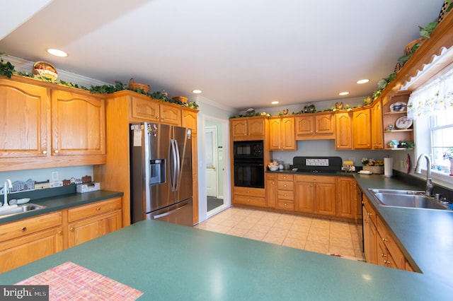 9 Holly Ter, Cambridge, MD 21613 - kitchen with black appliances, light tile patterned floors, crown molding, and a sink