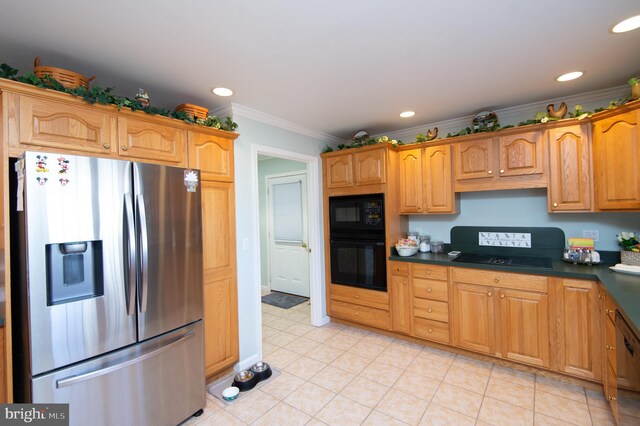 9 Holly Ter, Cambridge, MD 21613 - kitchen with dark countertops, crown molding, recessed lighting, light tile patterned flooring, and black appliances