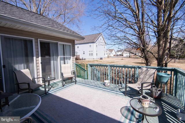 9 Holly Ter, Cambridge, MD 21613 - view of wooden balcony featuring a deck