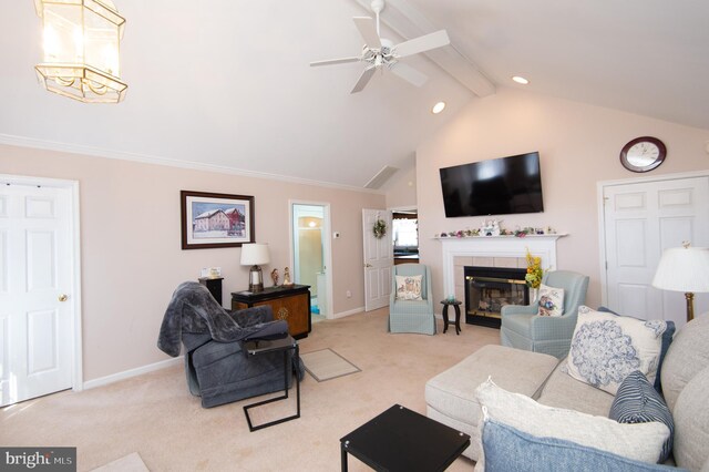 9 Holly Ter, Cambridge, MD 21613 - living room with light carpet, a tile fireplace, lofted ceiling with beams, and baseboards