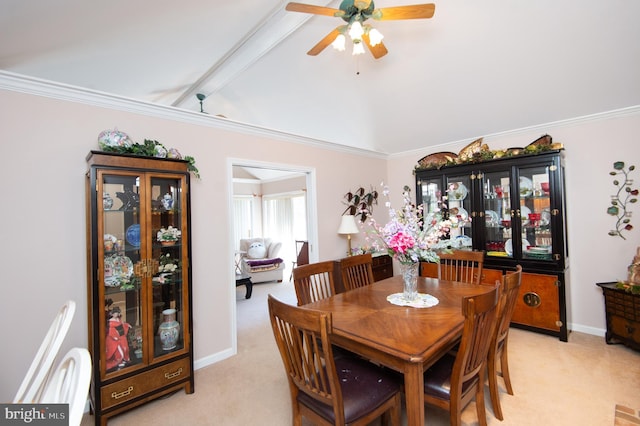 9 Holly Ter, Cambridge, MD 21613 - dining area featuring lofted ceiling with beams, baseboards, light carpet, and a ceiling fan