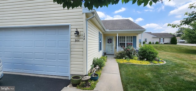 view of front of property with a shingled roof and a front yard