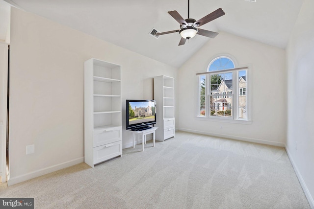 unfurnished living room featuring lofted ceiling, light colored carpet, visible vents, and baseboards