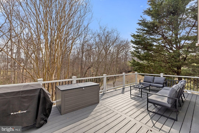 wooden terrace featuring outdoor lounge area