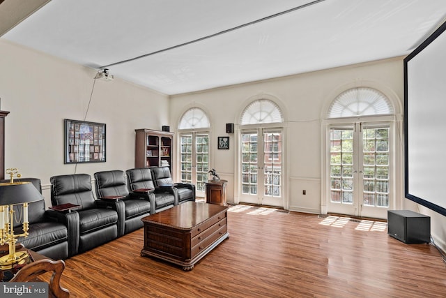 living room featuring french doors and wood finished floors