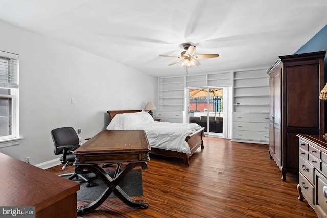 bedroom with access to exterior, dark wood-style flooring, baseboards, and a ceiling fan