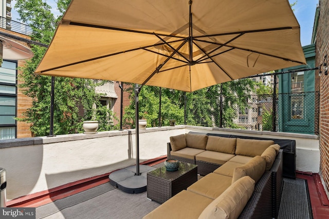 view of patio / terrace with an outdoor hangout area and a balcony