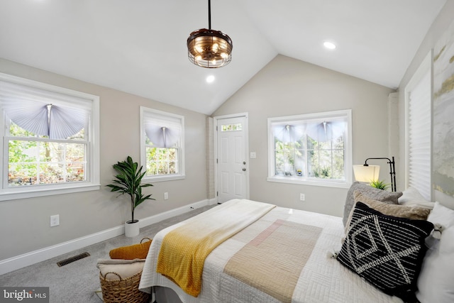 carpeted bedroom featuring lofted ceiling, recessed lighting, visible vents, and baseboards