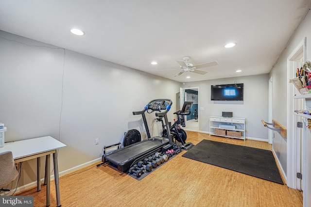 exercise area with baseboards, a ceiling fan, and recessed lighting