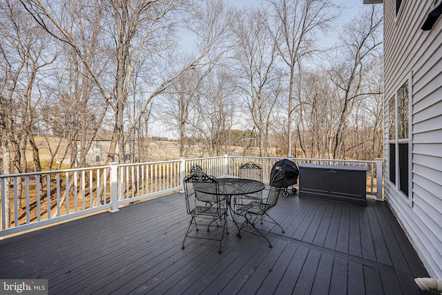 deck featuring outdoor dining space