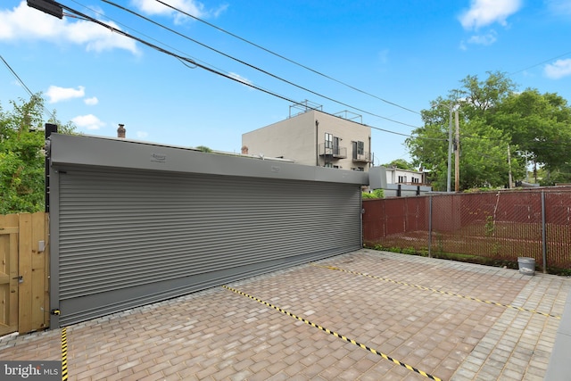 view of patio featuring fence