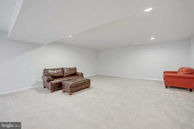 sitting room featuring recessed lighting, baseboards, and light colored carpet