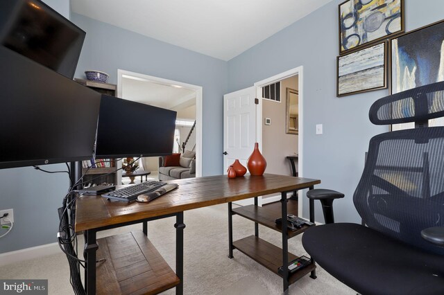 carpeted office featuring visible vents