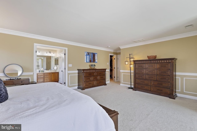 bedroom featuring crown molding, a decorative wall, visible vents, and light carpet