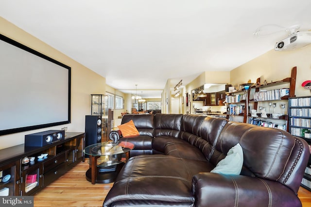 interior space featuring an inviting chandelier and light wood-style floors