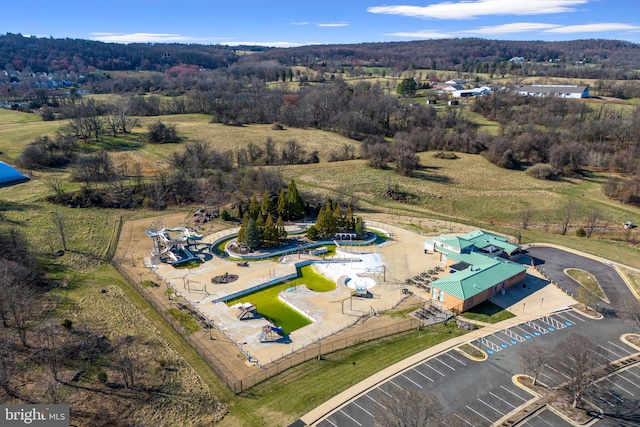 bird's eye view featuring a view of trees