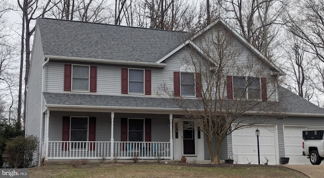 view of front of house with a porch, a shingled roof, driveway, and an attached garage