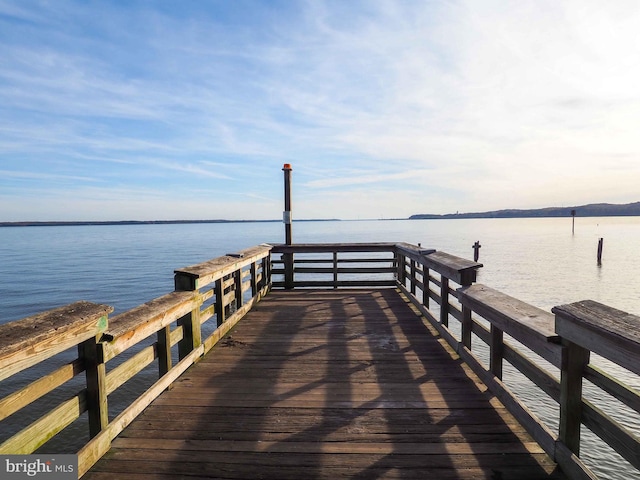 view of dock with a water view