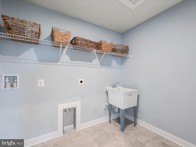 laundry room with laundry area, washer hookup, baseboards, and electric dryer hookup