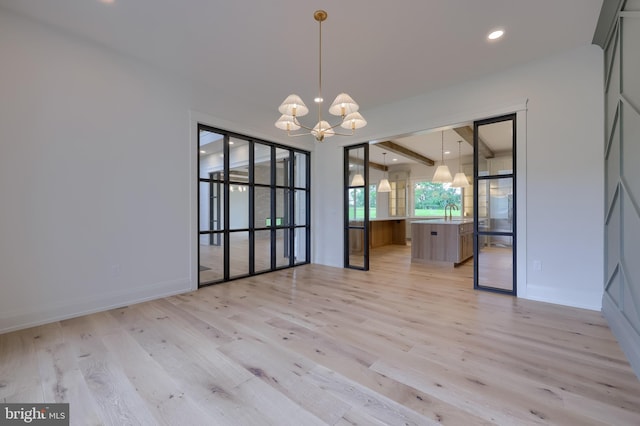 11 Sailfish Dr, Mechanicsburg, PA 17050 - empty room with a chandelier, light wood finished floors, and recessed lighting