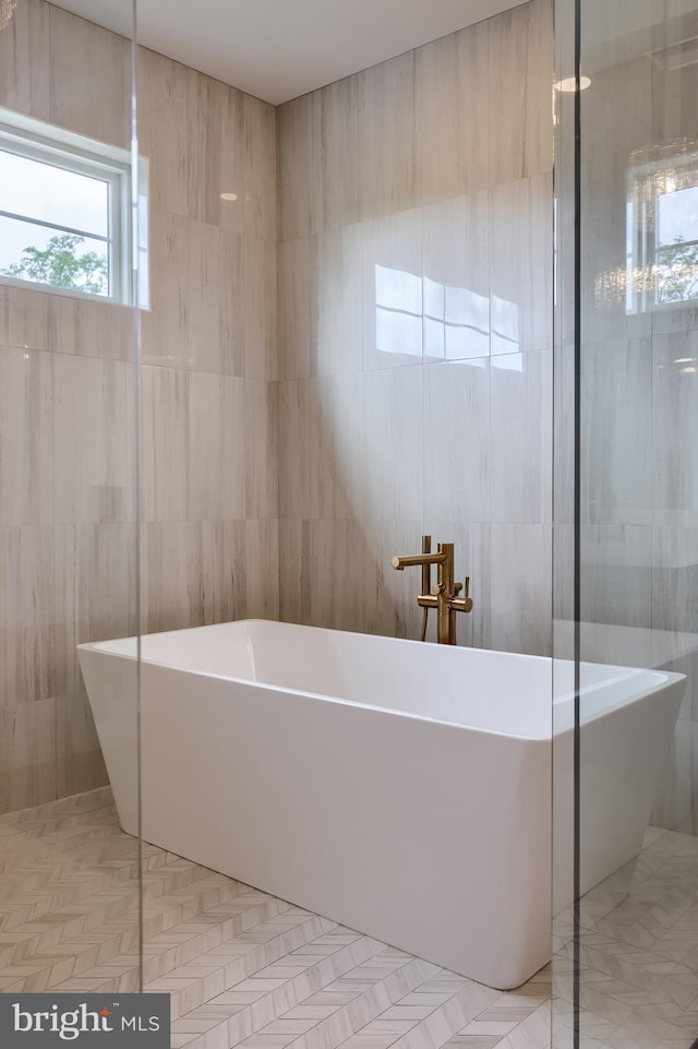 11 Sailfish Dr, Mechanicsburg, PA 17050 - full bath with tile walls and a soaking tub