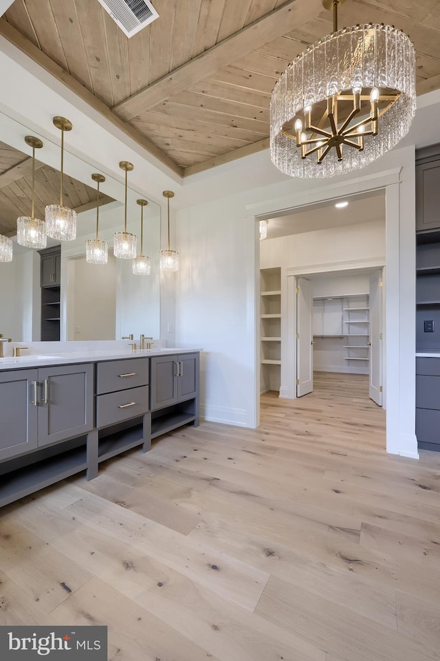 11 Sailfish Dr, Mechanicsburg, PA 17050 - full bathroom with a wooden ceiling with exposed beams, double vanity, a chandelier, and wood finished floors