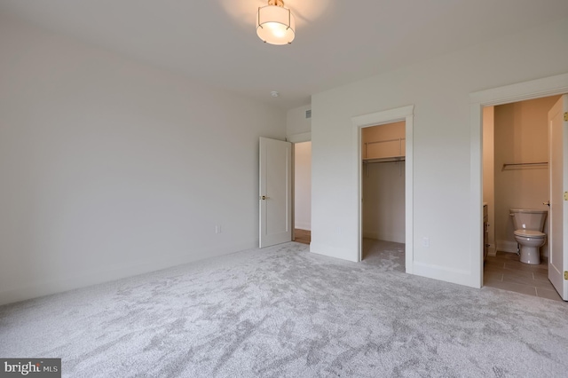 11 Sailfish Dr, Mechanicsburg, PA 17050 - unfurnished bedroom with carpet flooring, a walk in closet, a closet, and connected bathroom