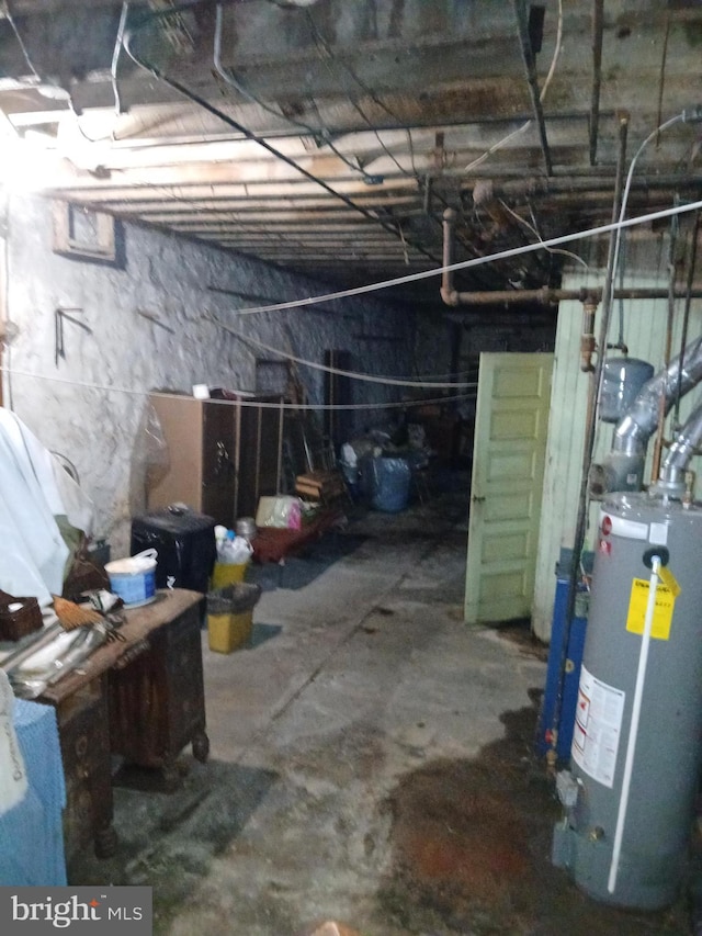 unfinished below grade area with gas water heater