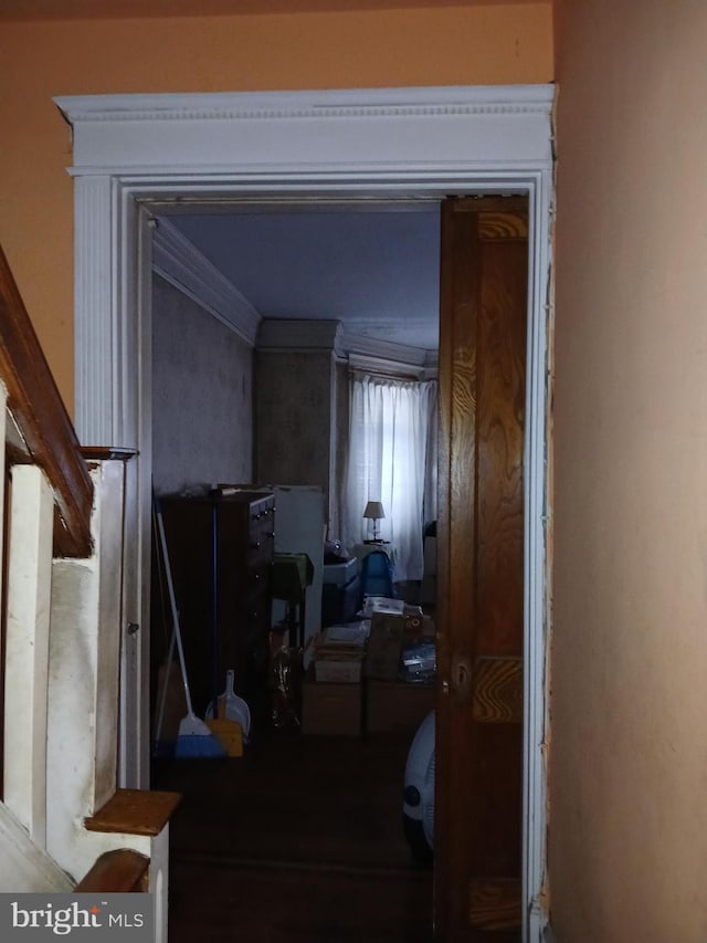 corridor with crown molding