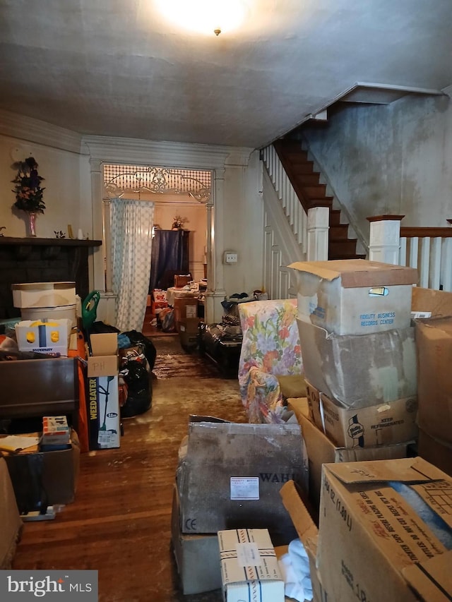 interior space featuring stairway and wood finished floors