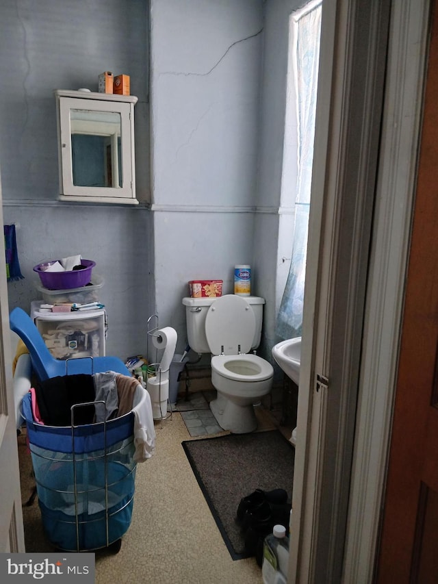 half bathroom with toilet