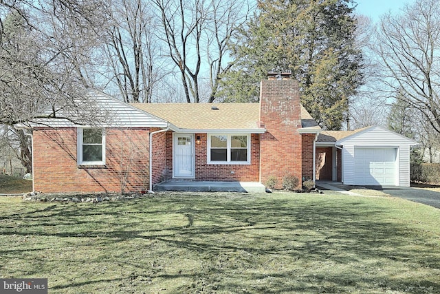 single story home with driveway, brick siding, a chimney, an attached garage, and a front yard