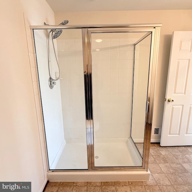 full bathroom with a stall shower