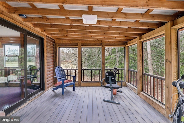 unfurnished sunroom featuring a wealth of natural light