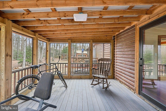 sunroom / solarium with beamed ceiling