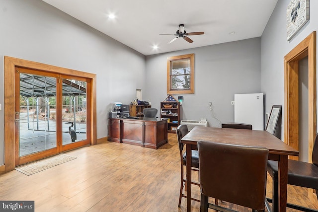 home office featuring light wood finished floors, baseboards, a ceiling fan, and recessed lighting