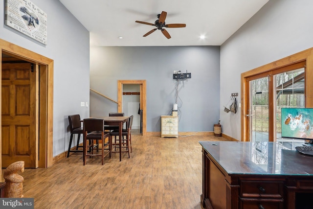 dining area featuring recessed lighting, wood finished floors, a ceiling fan, and baseboards