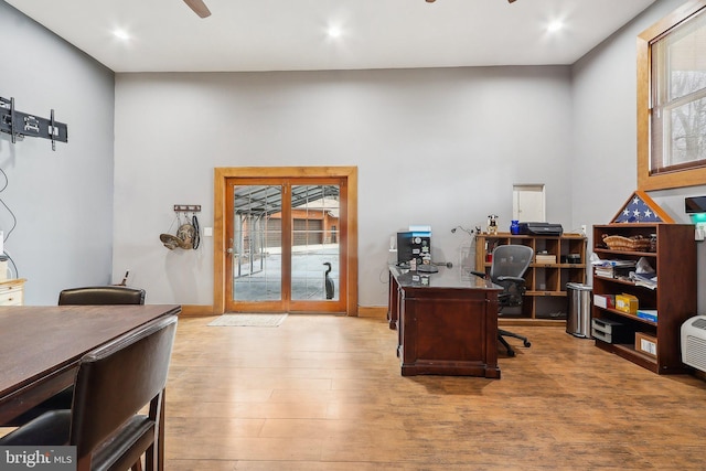 home office featuring recessed lighting, wood finished floors, a ceiling fan, and baseboards