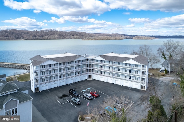 drone / aerial view with a water view