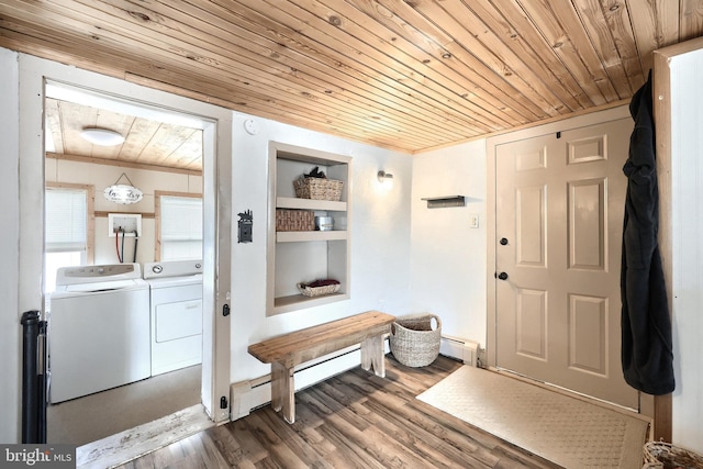 mudroom featuring built in features, a baseboard radiator, wood ceiling, wood finished floors, and washing machine and clothes dryer