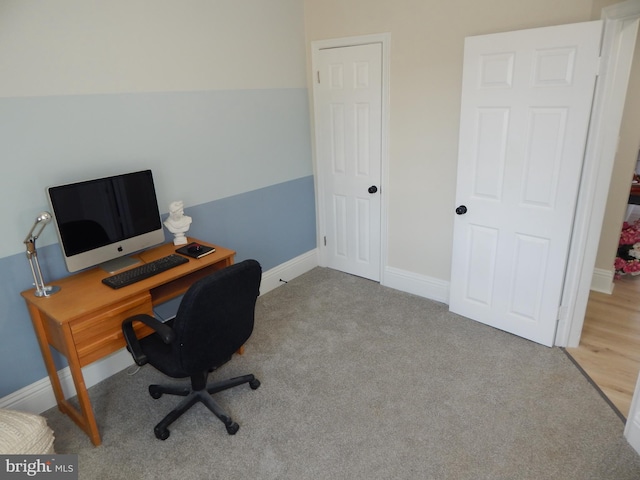 office featuring carpet and baseboards