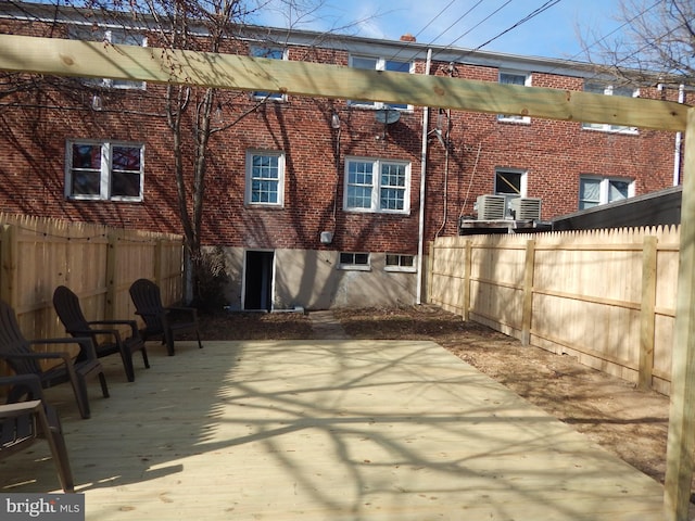 view of patio featuring fence