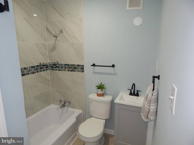 full bathroom featuring washtub / shower combination, toilet, vanity, and visible vents