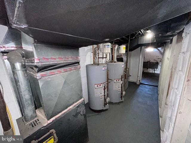 utility room featuring water heater