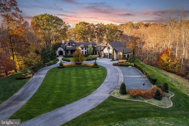 exterior space featuring a wooded view