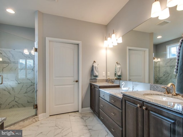 full bathroom featuring a sink, visible vents, baseboards, marble finish floor, and a marble finish shower