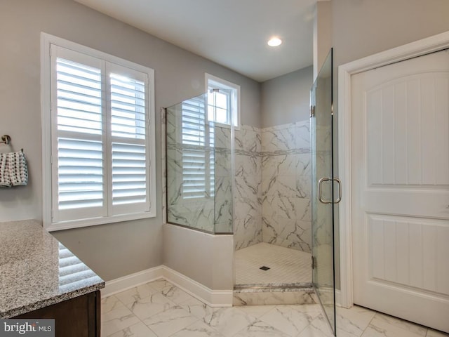 full bathroom with a marble finish shower, baseboards, marble finish floor, vanity, and recessed lighting