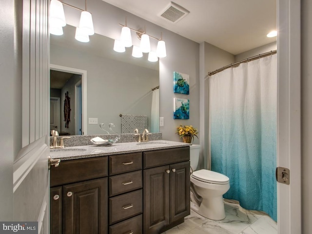 full bath with toilet, marble finish floor, a sink, and visible vents