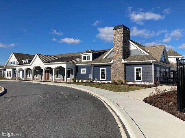 exterior space with sidewalks and curbs