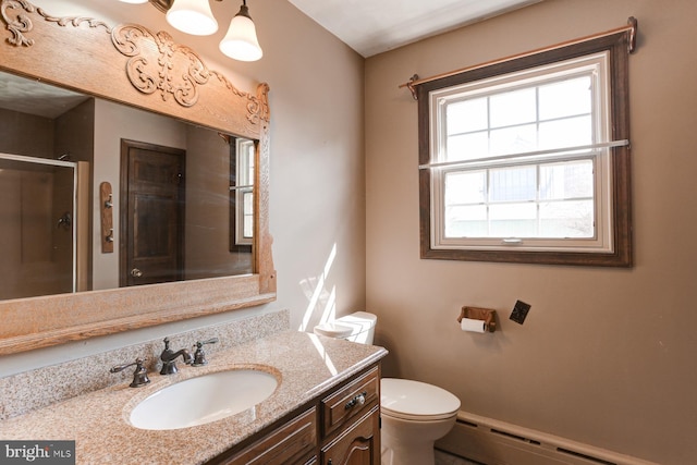 full bath featuring a baseboard radiator, toilet, a stall shower, vanity, and baseboards